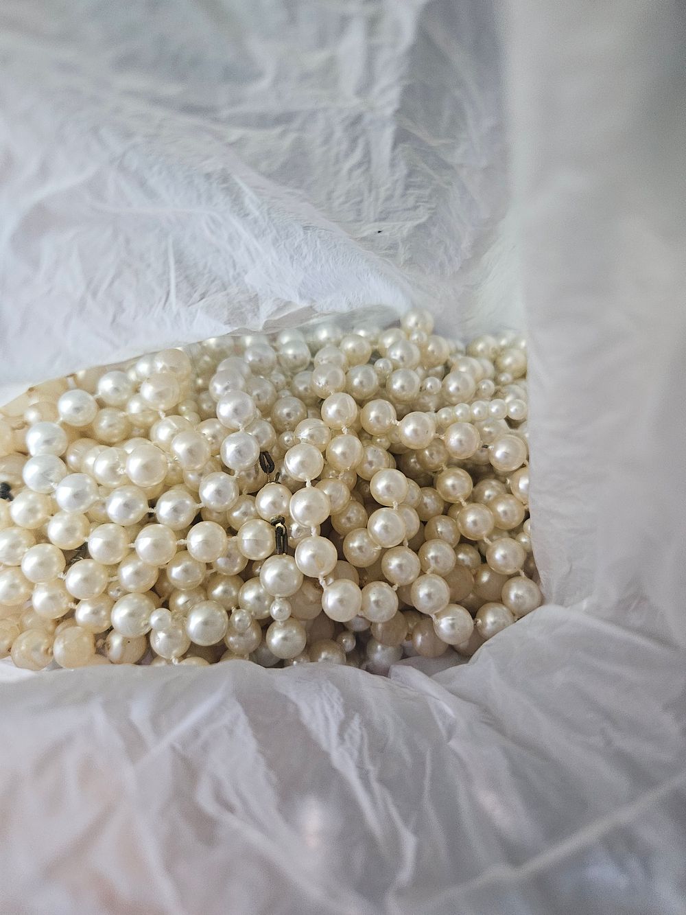 Lot 317 – A Collection of Pearlescent Bead Necklaces