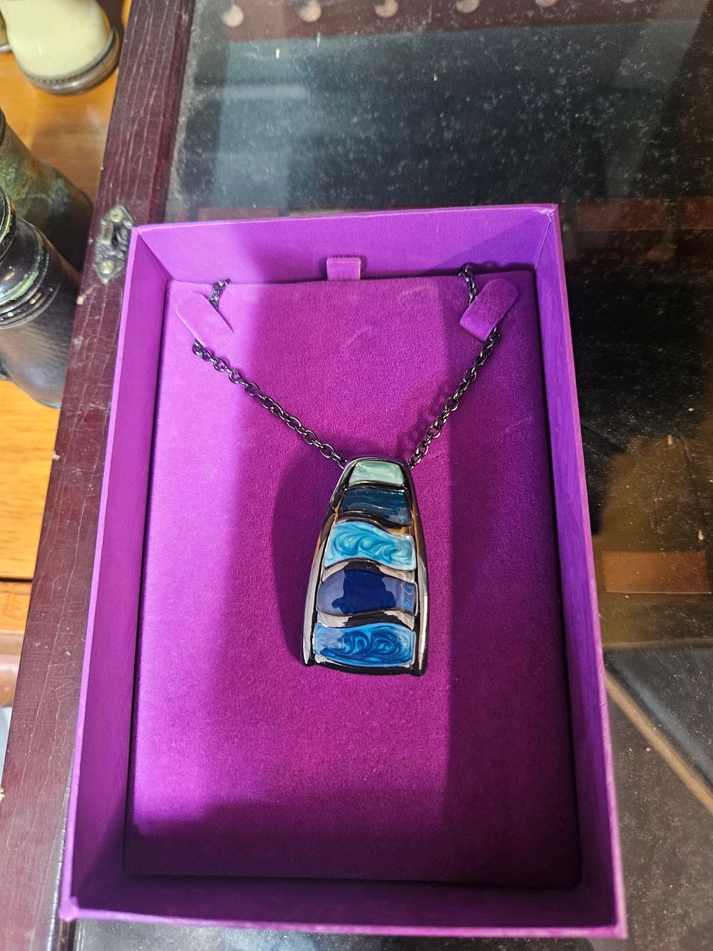 Lot 329 – An enamel pendant necklace in the style of the Camille Faure School, Limoges