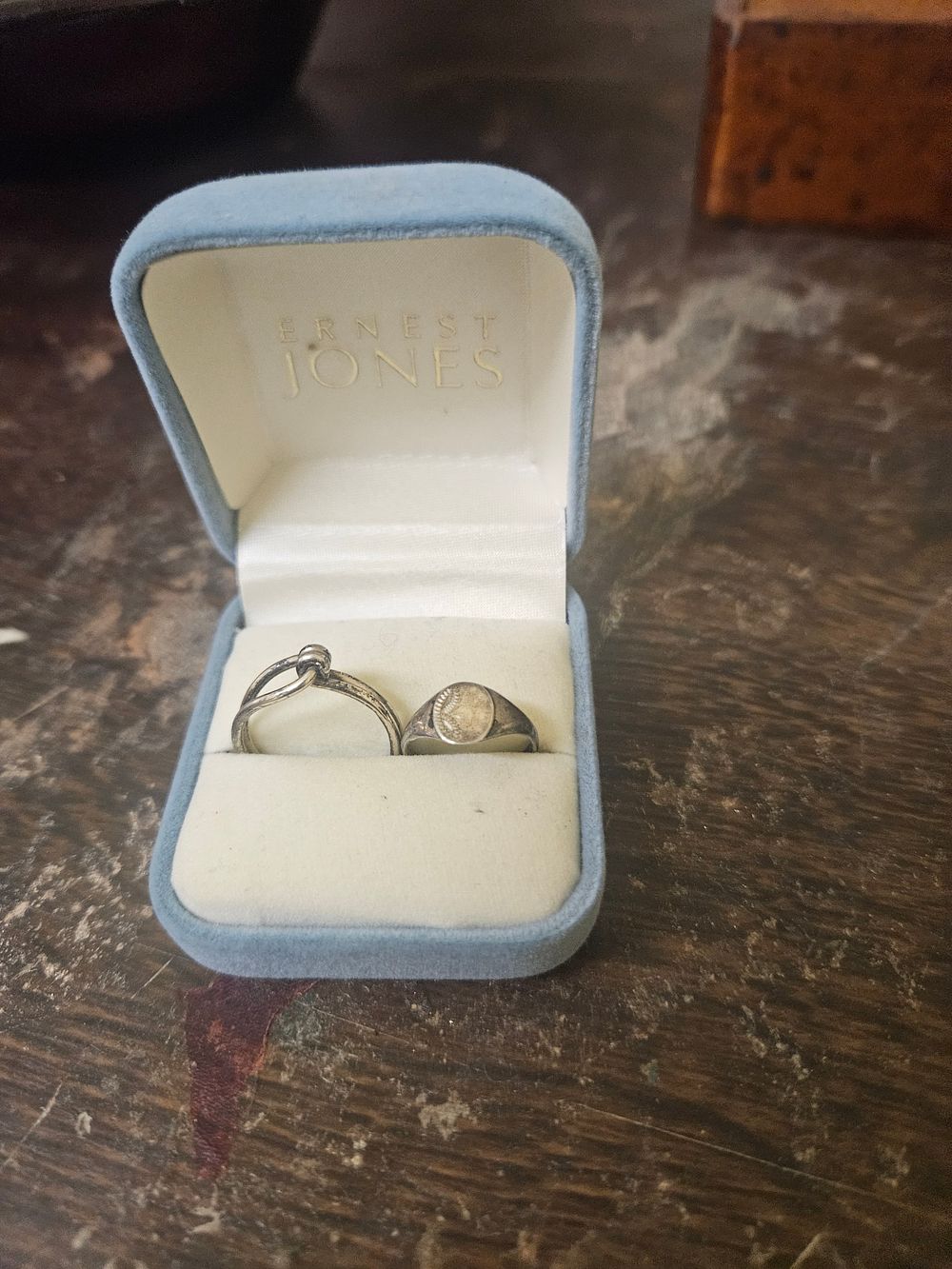 Lot 339 – Two Silver-Toned Rings in an Ernest Jones Presentation Box