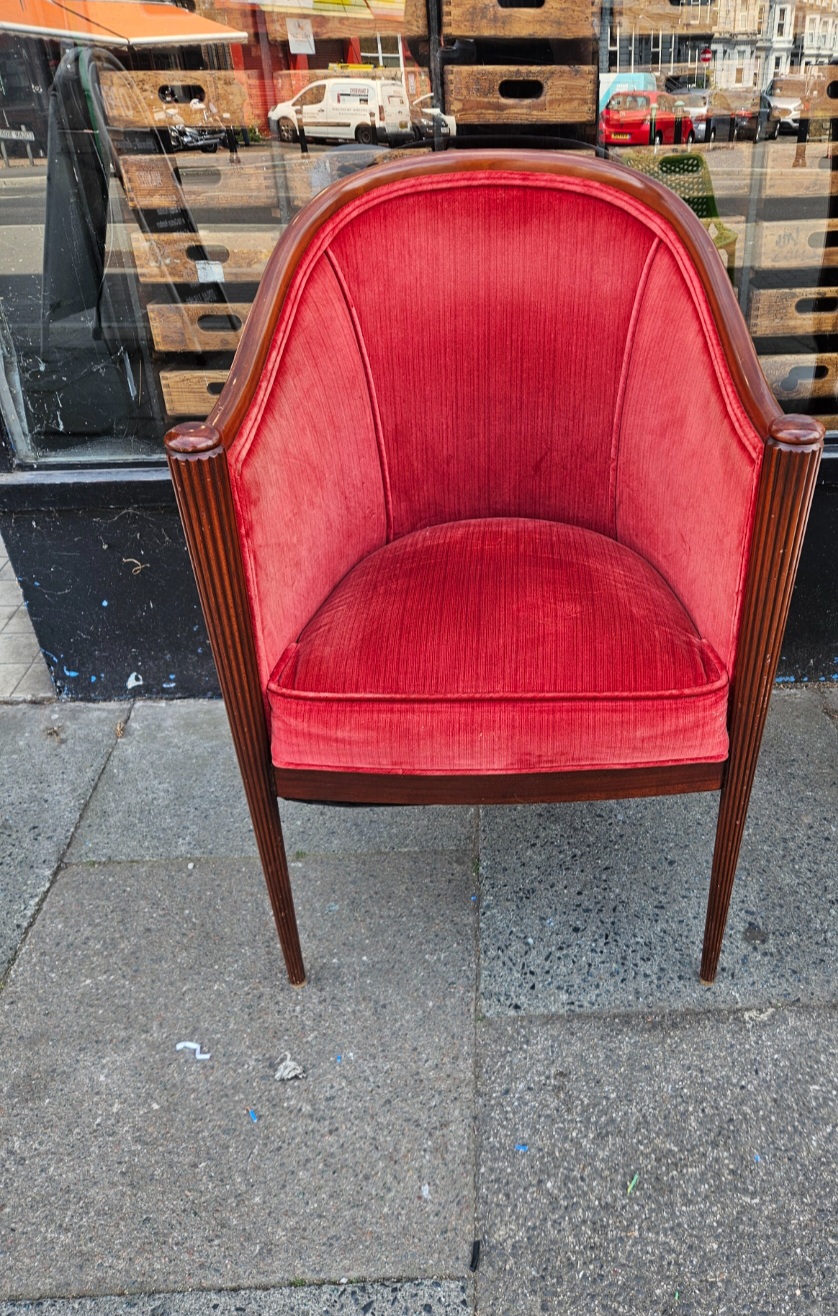 An Art Deco Style Red Velvet Upholstered Tub Chair with Fluted Woodwork