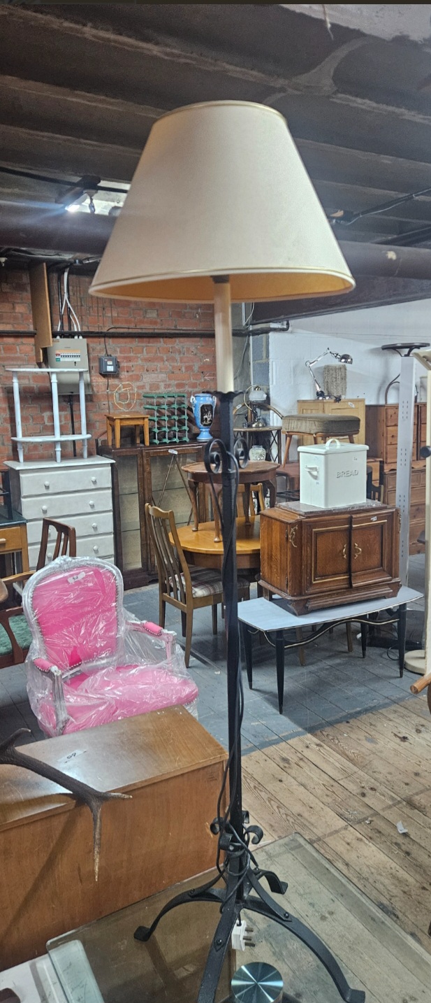 A Gothic Revival style wrought iron floor lamp