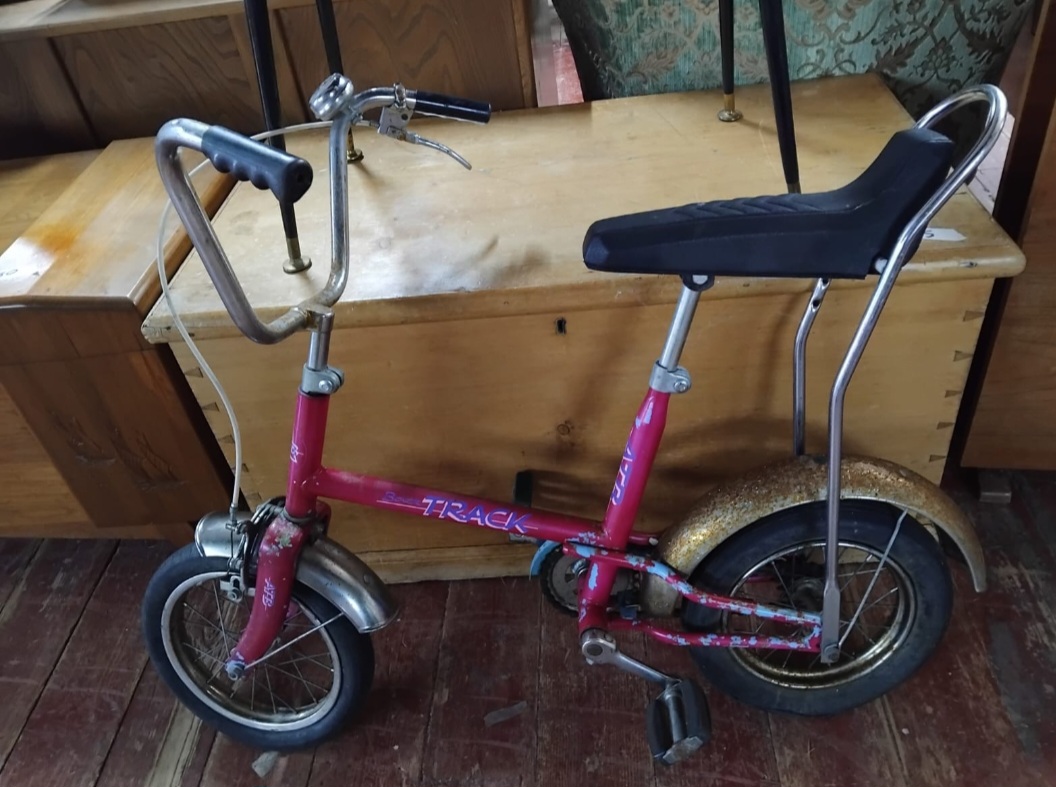 A Super Track child's mini chopper bicycle