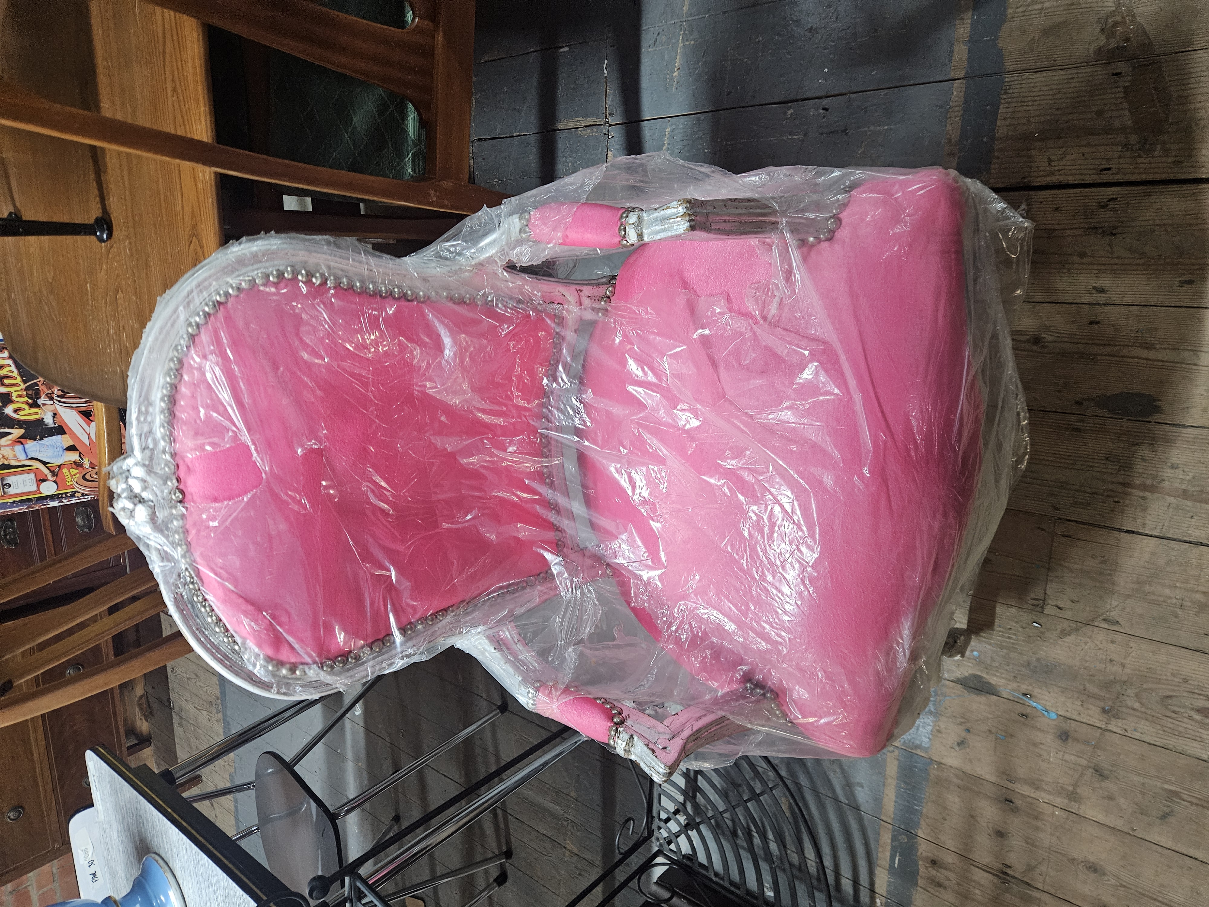 A Baroque Style Pink Velvet and Silvered Wood Armchair