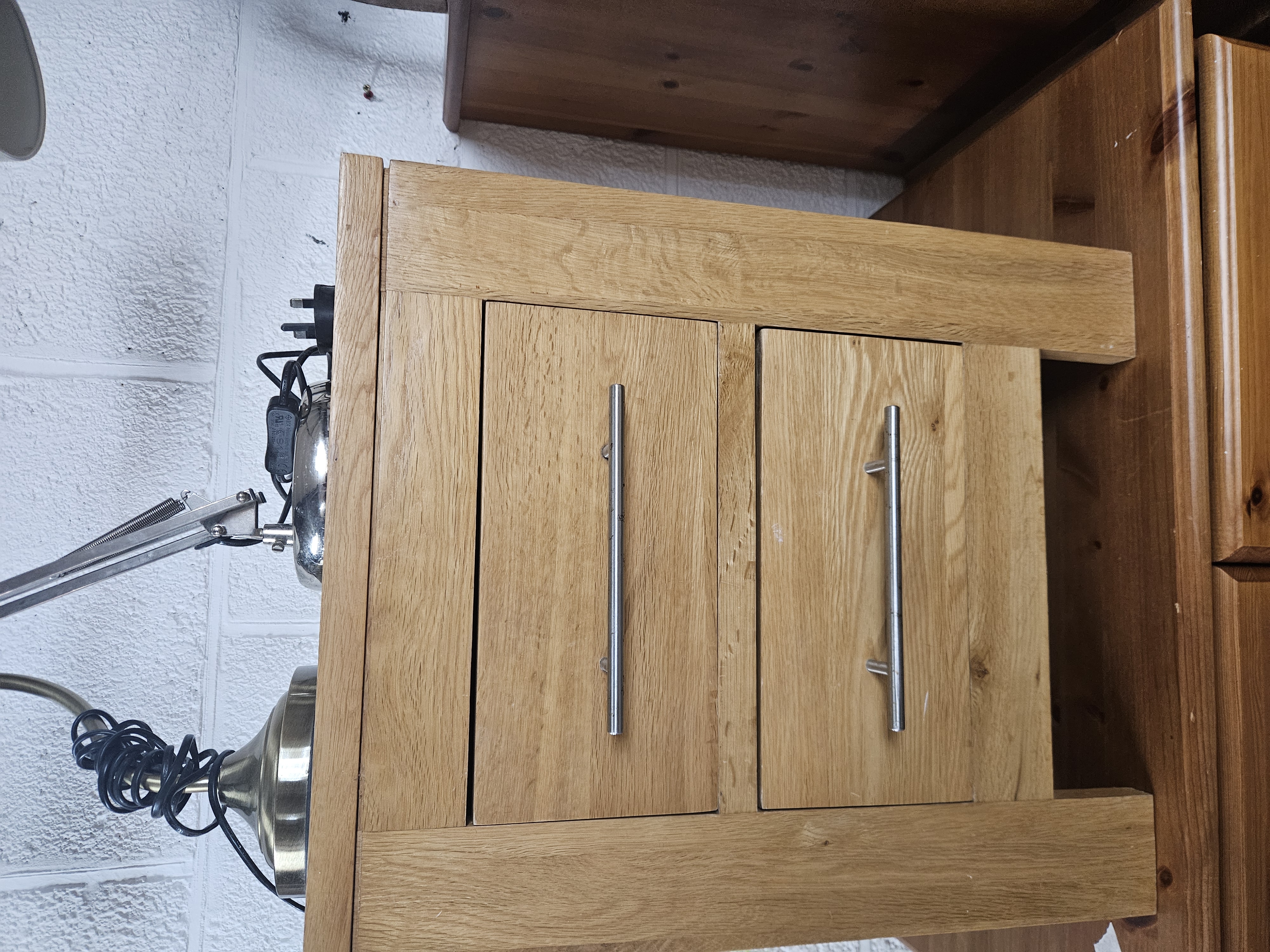 A Contemporary Oak Two-Door Small Cabinet