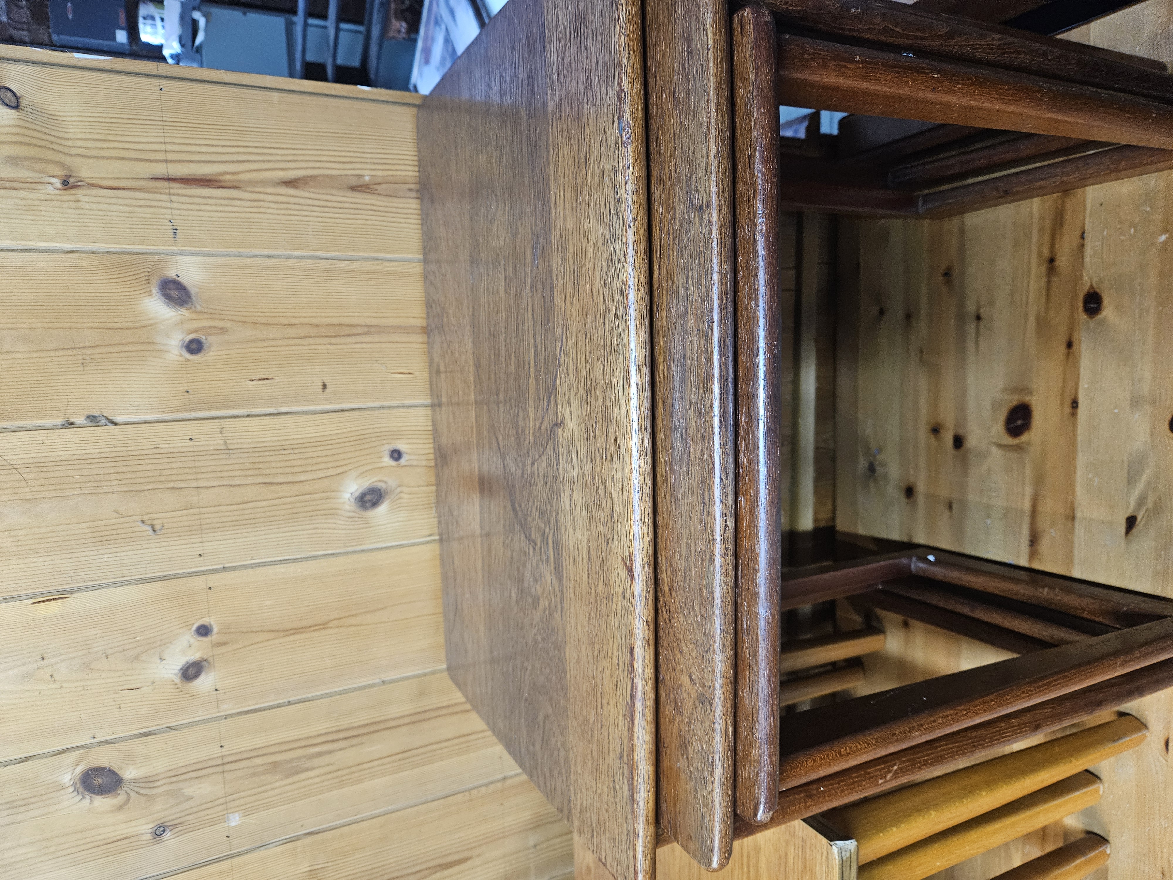 A Nest of Three Mid-Century Modern Teak Tables