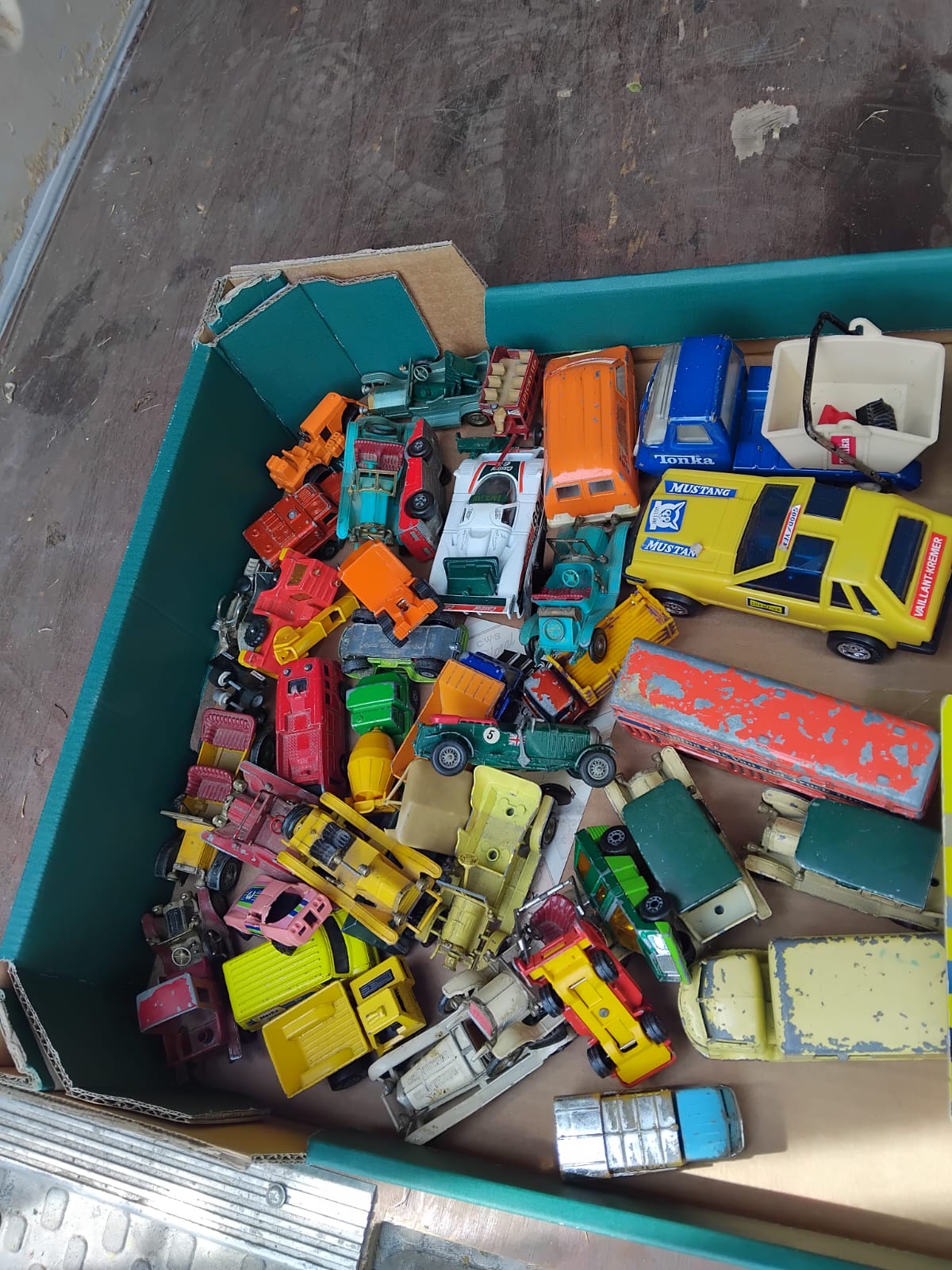 A Collection of Vintage Die-Cast and Plastic Toy Vehicles including Tonka, Matchbox, and Lesney