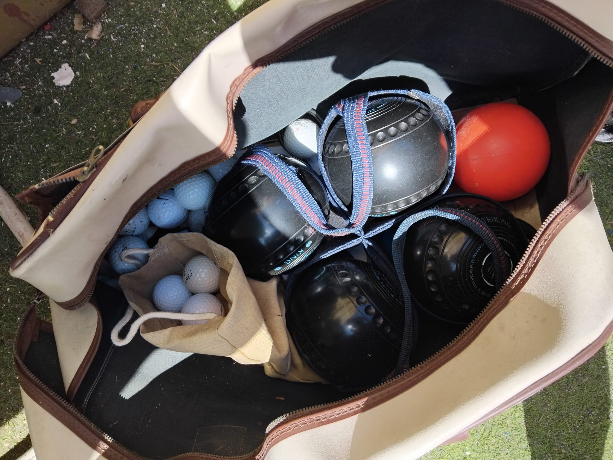 A Collection of Vintage Lawn Bowls and Golfing Equipment including Almark and Manning Bowls