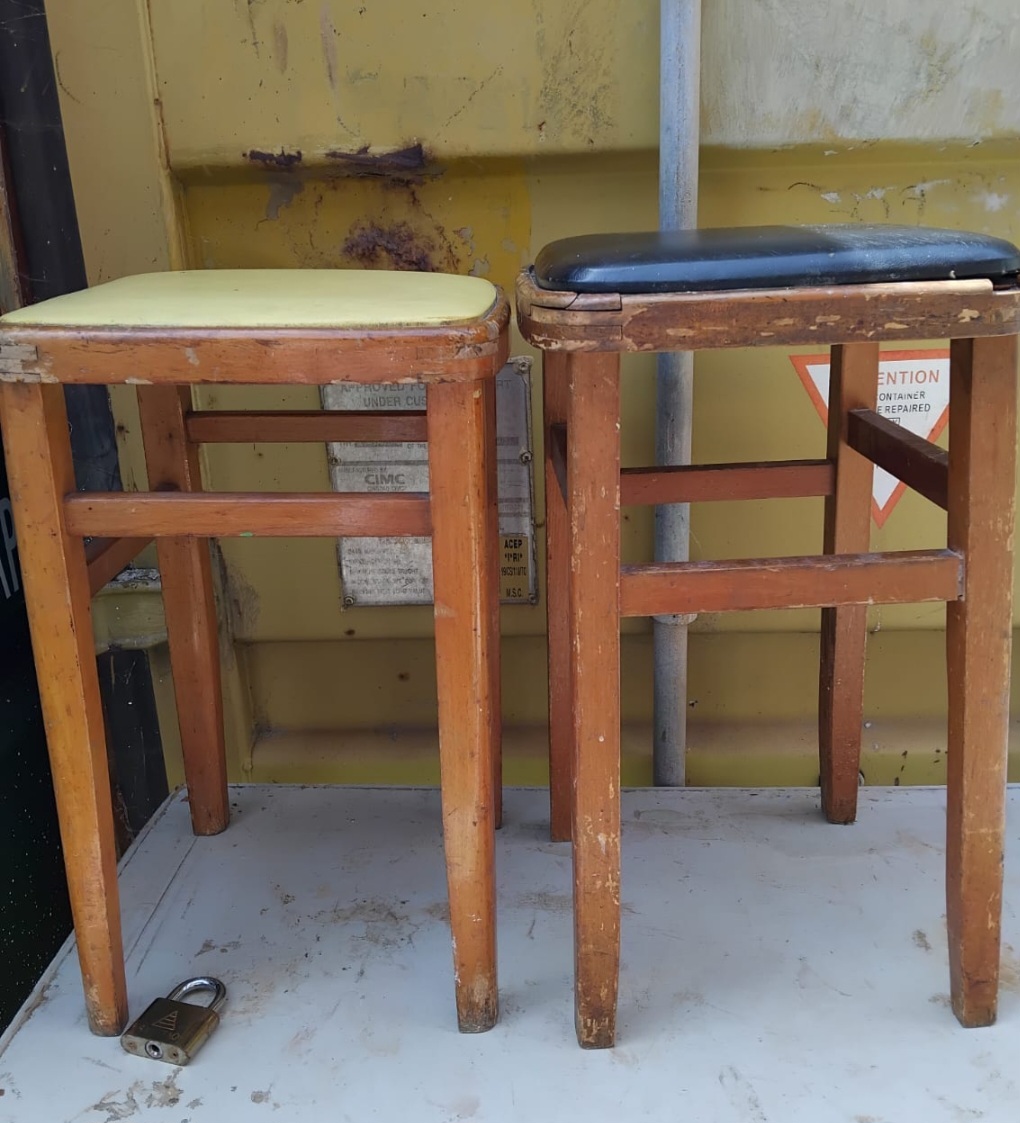 A Pair of Mid-Century Industrial Utility Stools with Vinyl Seats
