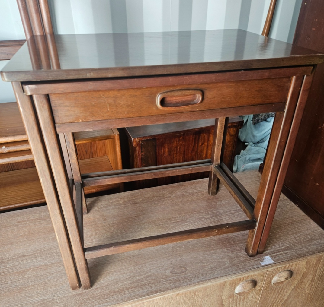 A Mid-century Modern Teak Nest of Two Tables