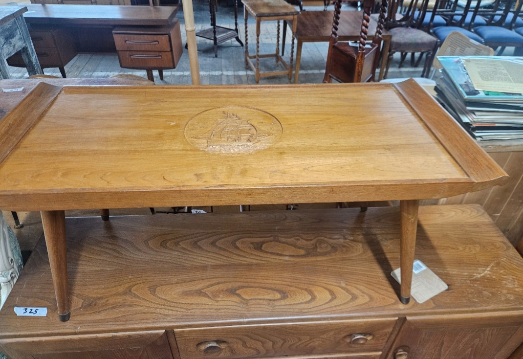 Mid-century Modern Coffee Table with Carved Ship Motif