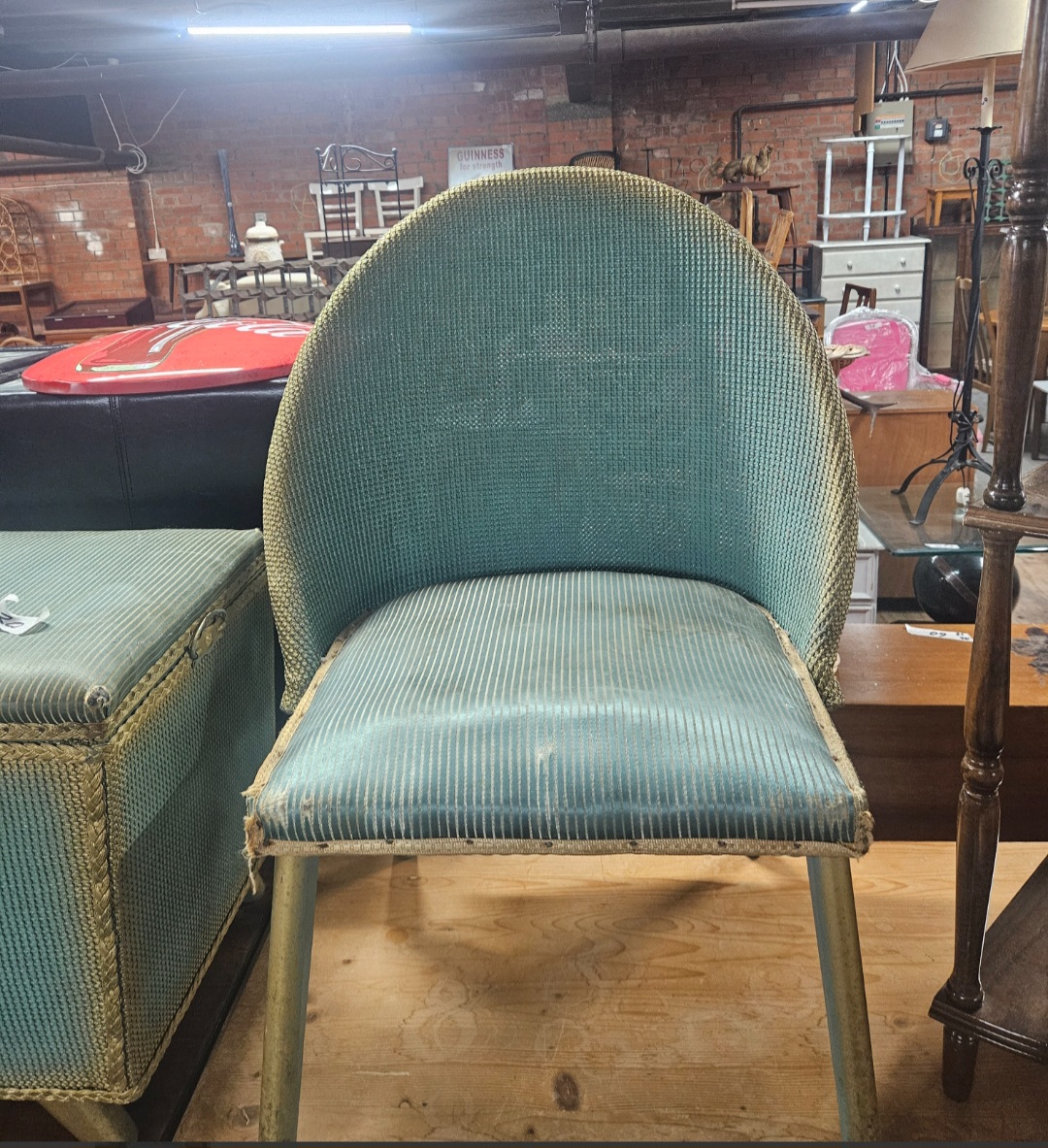 A Mid-Century Lloyd Loom Arched Back Side Chair and Matching Ottoman