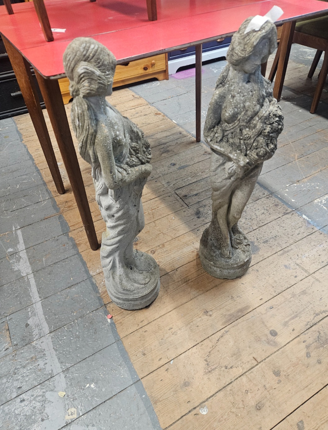 A Pair of Weathered Cast Stone Garden Statues of Classical Maidens
