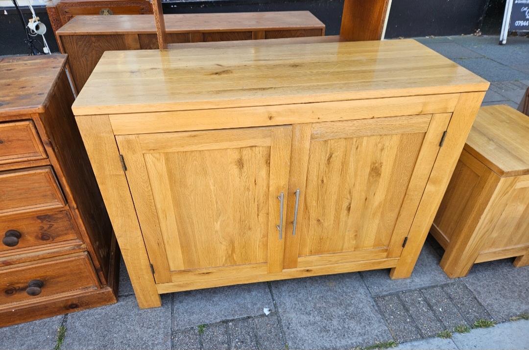 A Contemporary Light Oak Two Door Sideboard