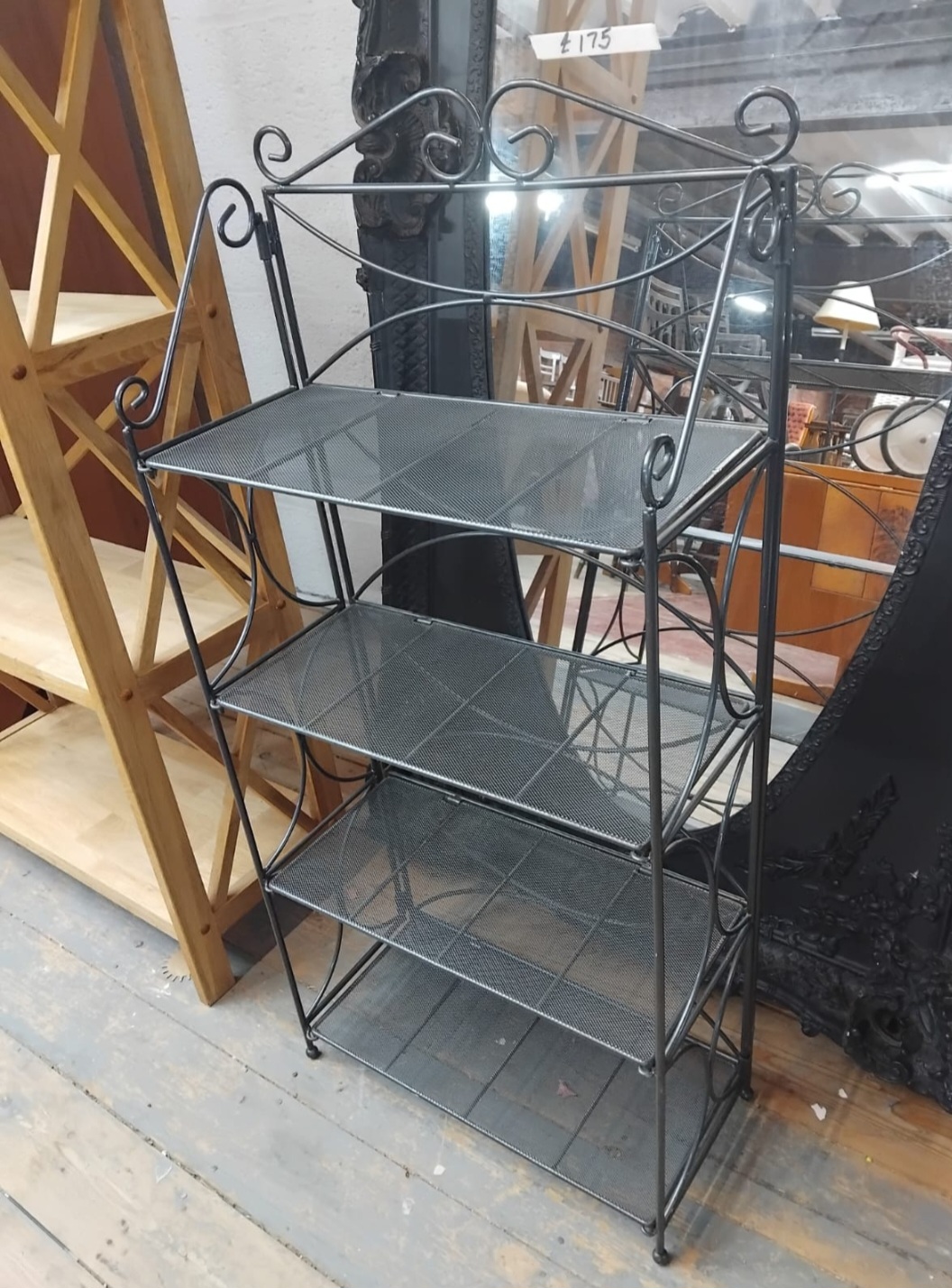 A Four-Tier Folding Metal Wirework Bakers Rack