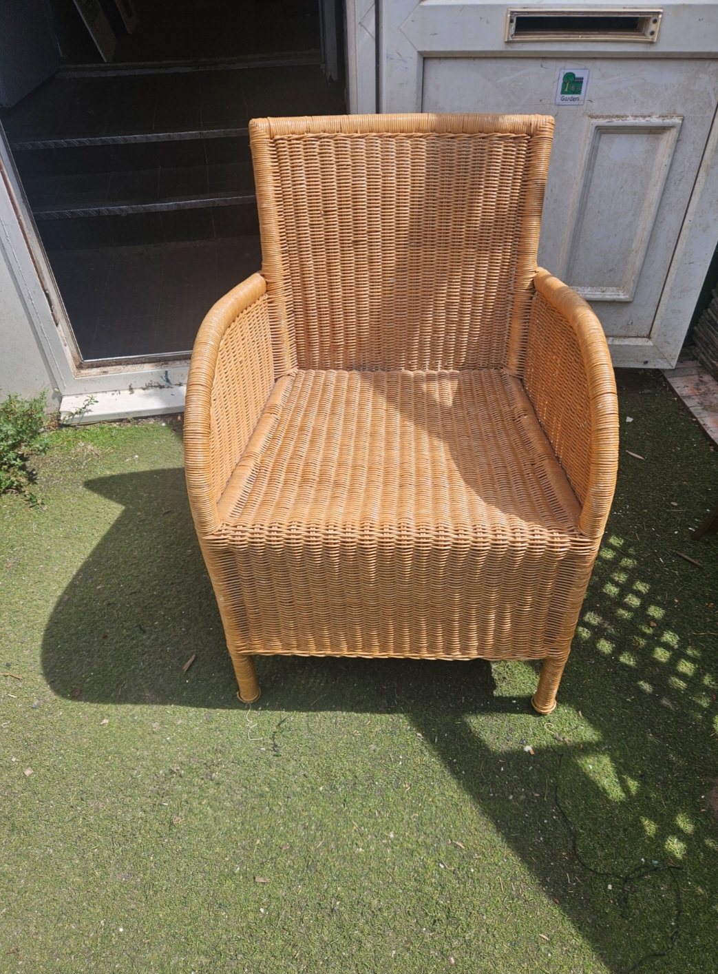 A Contemporary Woven Wicker Armchair