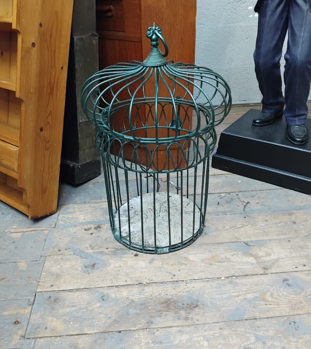 A Decorative Green Painted Metal Wirework Crown Top Birdcage