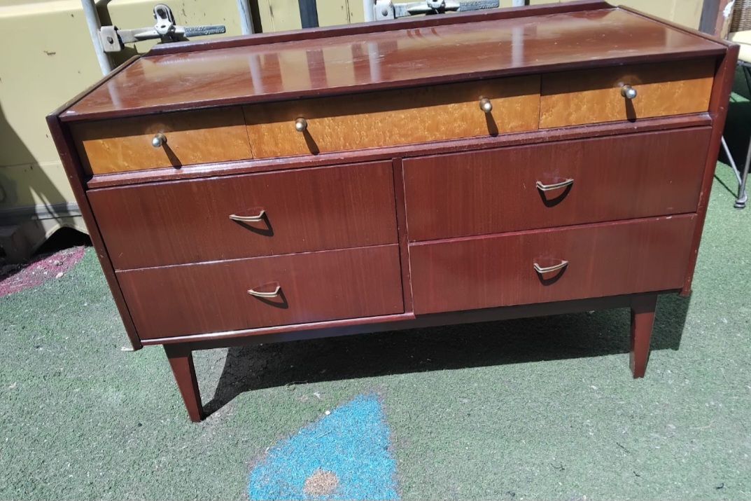 A Mid-Century Modern two-tone eight-drawer chest of drawers