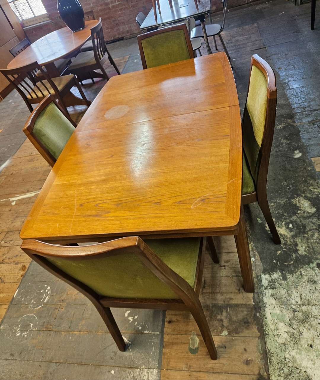Nathan Furniture Mid-Century Modern Teak Extending Dining Table and a Set of Matching Chairs