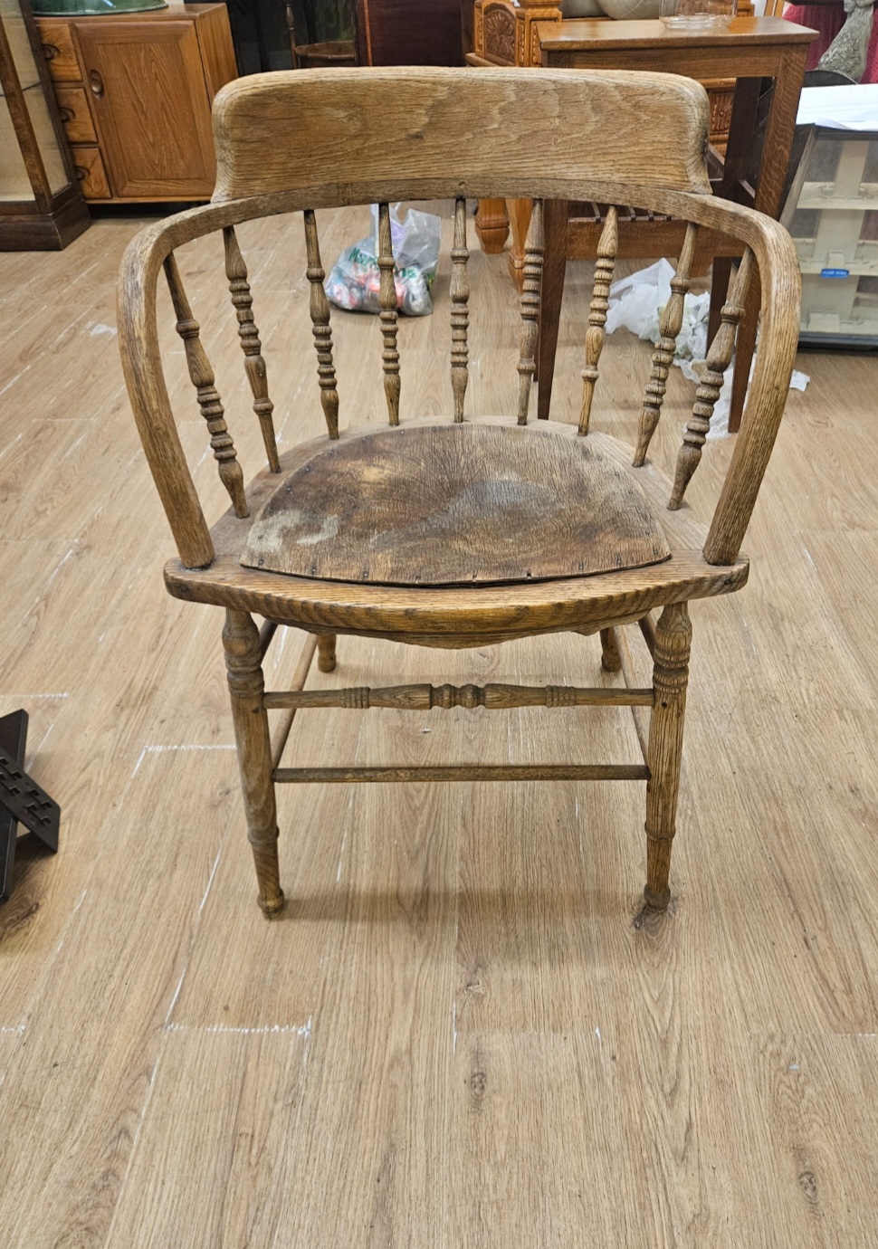 A Victorian Oak Smoker's Bow Armchair