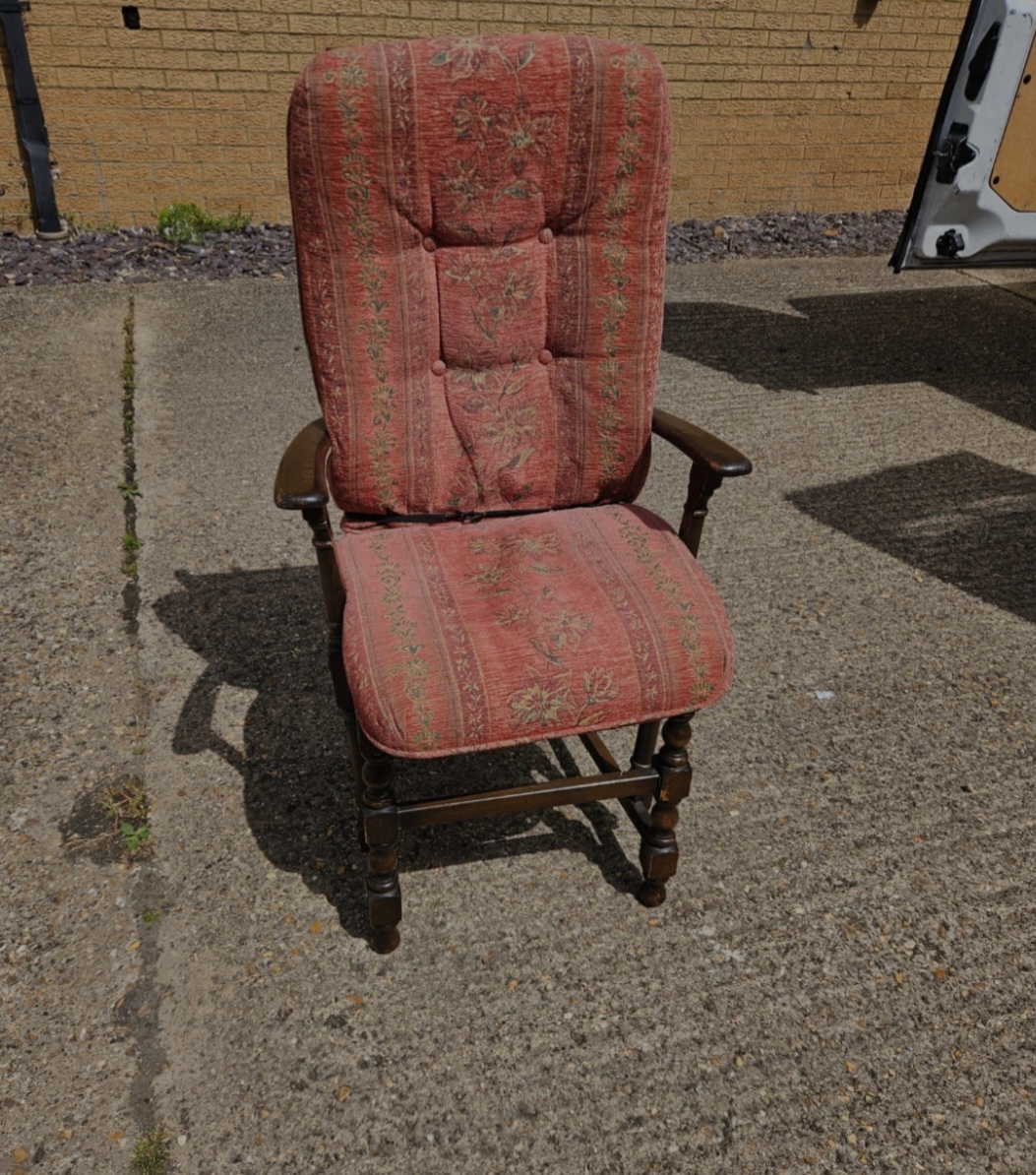 An Ercol Old Colonial Dark Stained Wood High-Back Armchair, 1978