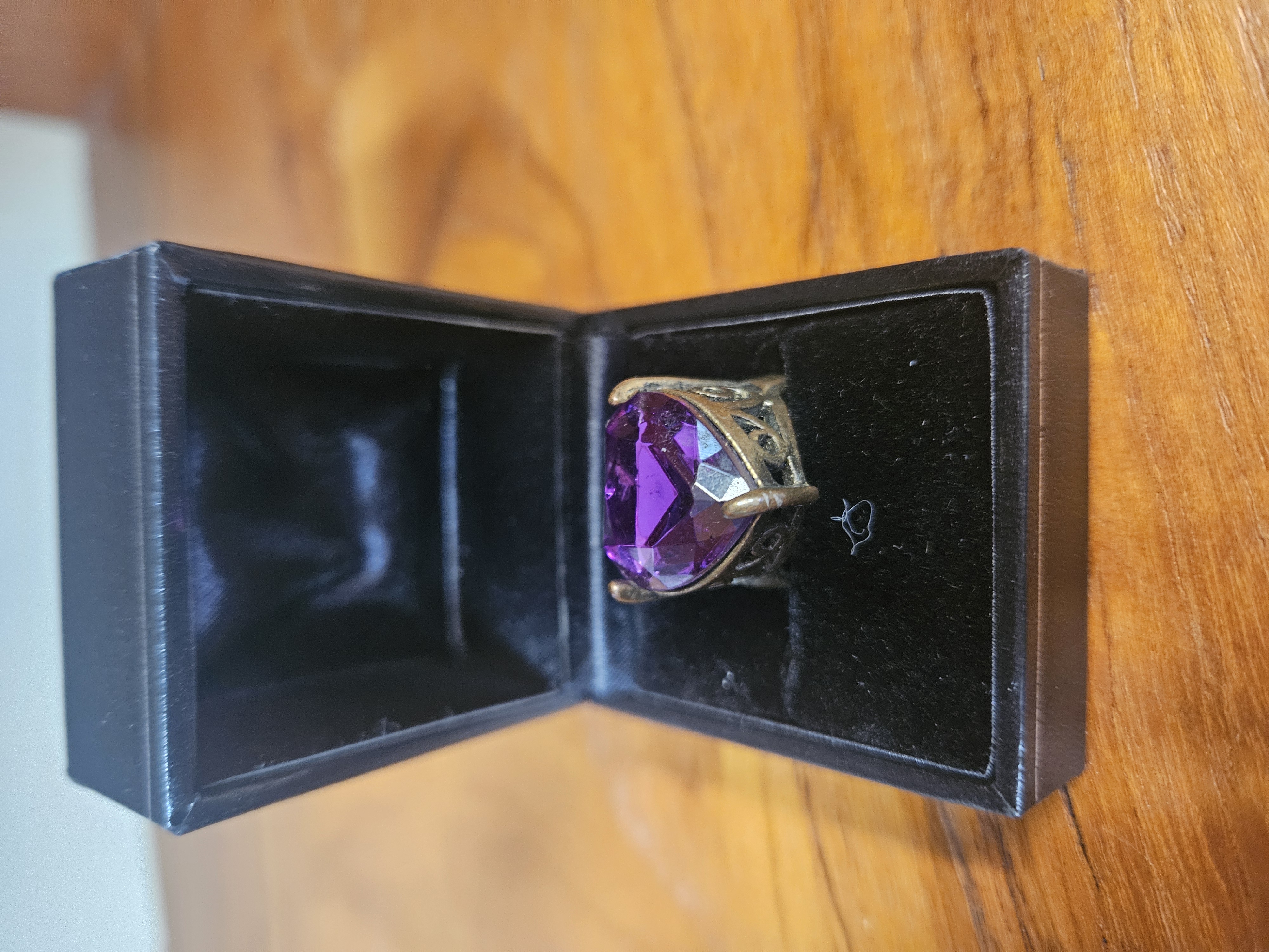 Vintage heart-cut purple stone cocktail ring with ornate filigree gallery