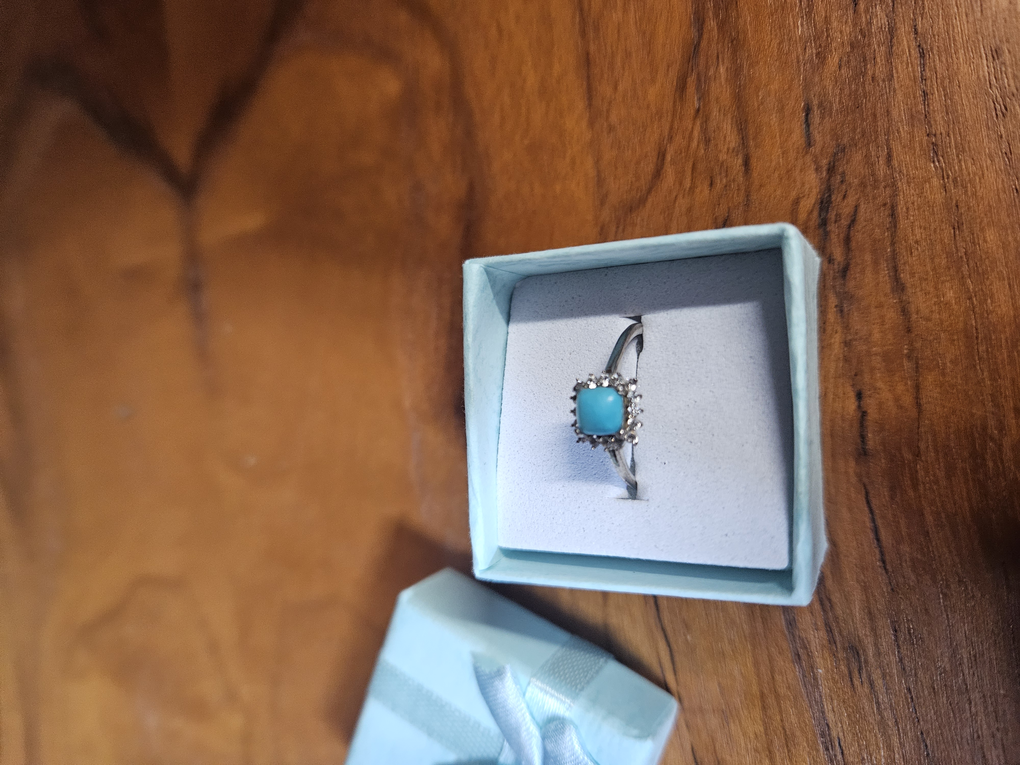 A Contemporary silver Turquoise and White Stone Cluster Ring