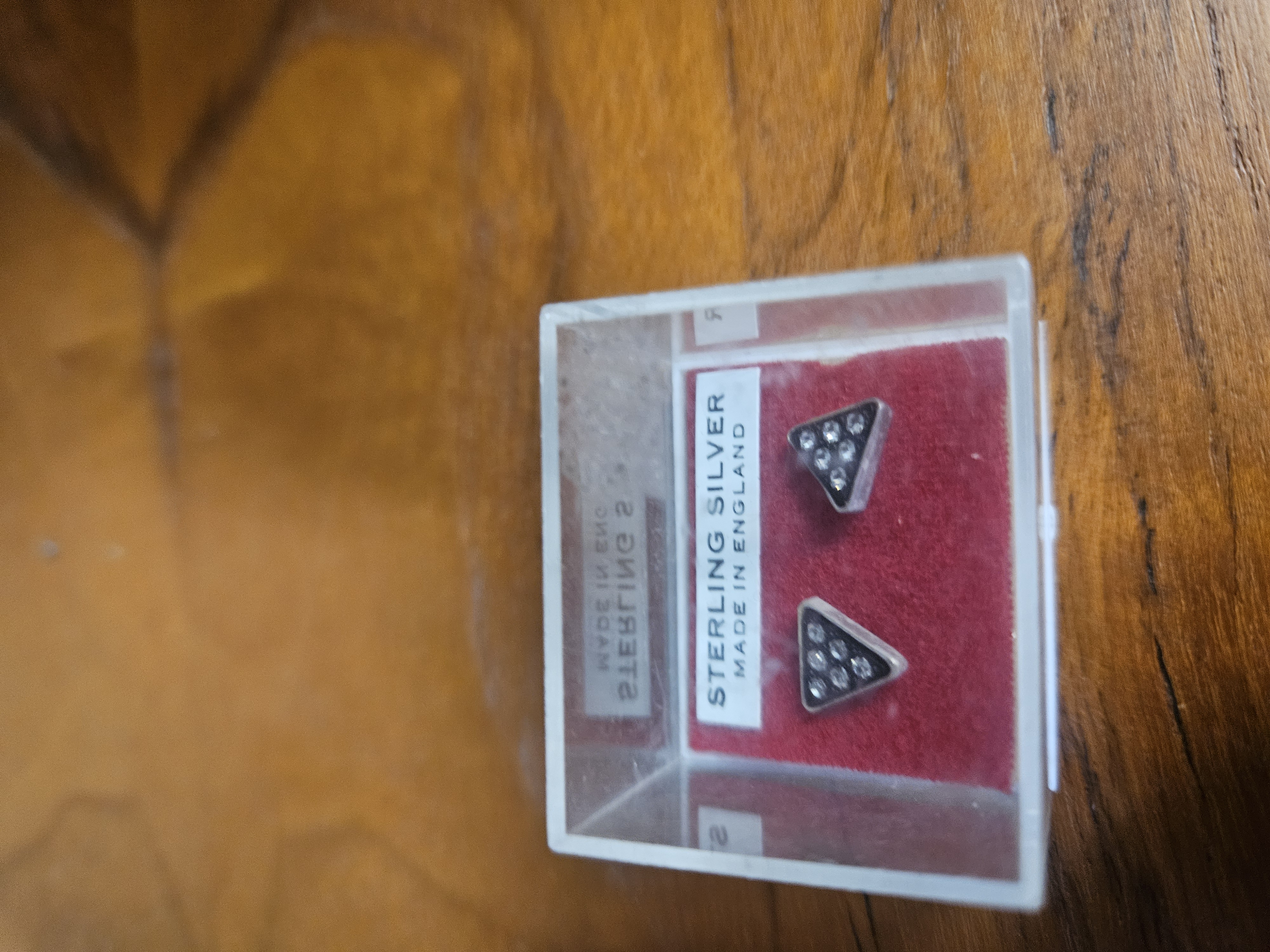 A Pair of Sterling Silver and Clear Stone Triangular Stud Earrings