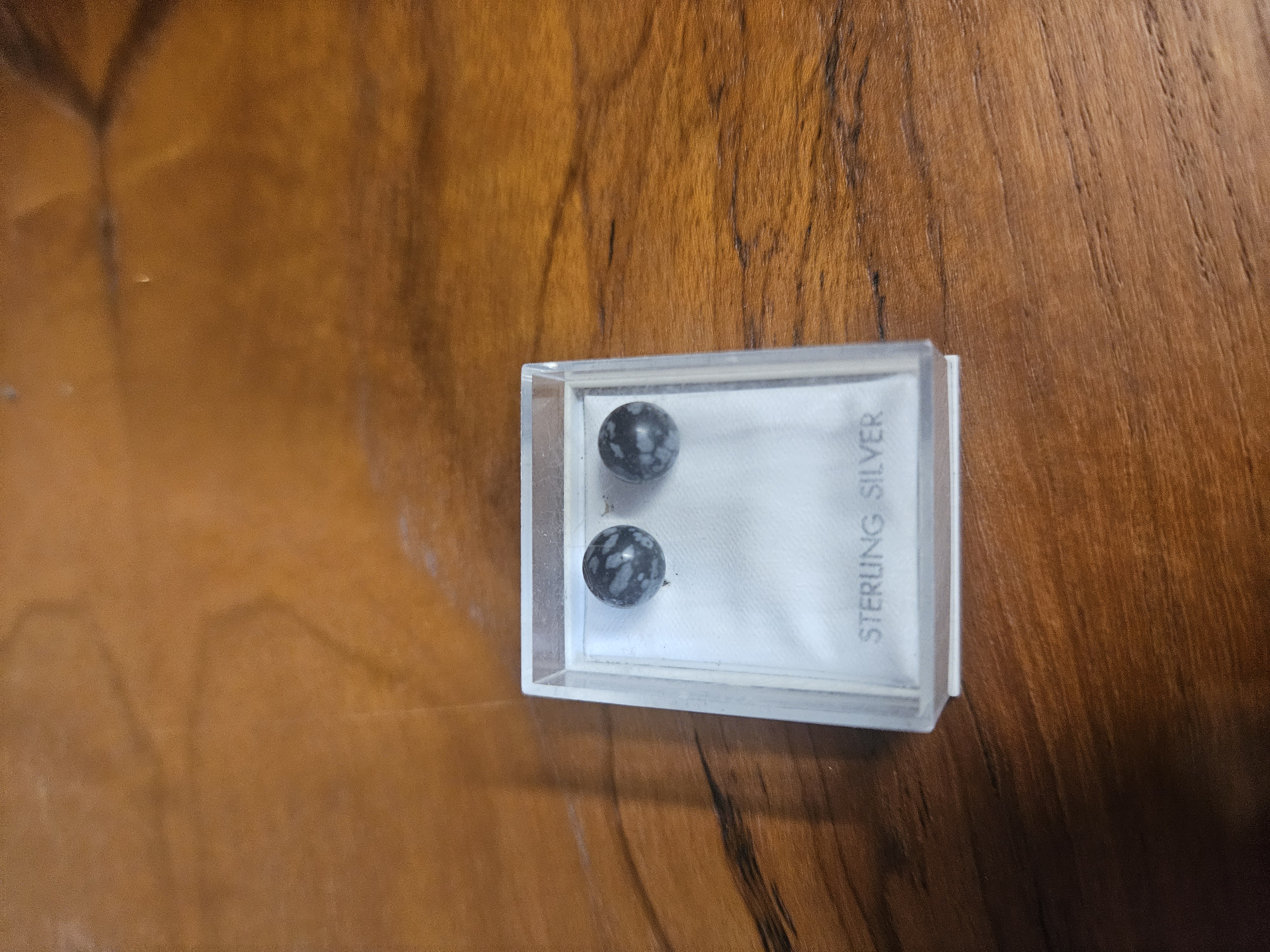 A Pair of Snowflake Obsidian and Sterling Silver Stud Earrings
