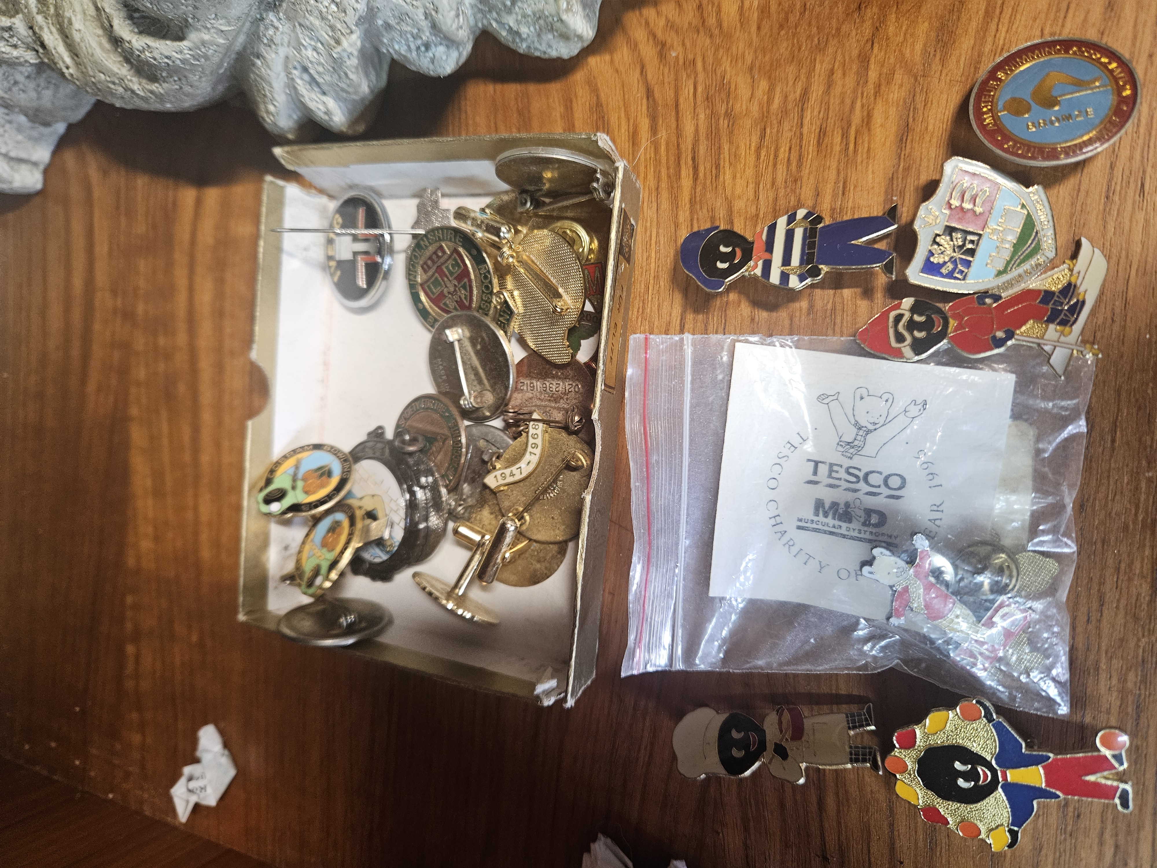 A Collection of Vintage Robertson's Golly Badges, Tesco Charity Pin, and Assorted Enamel Club Pins