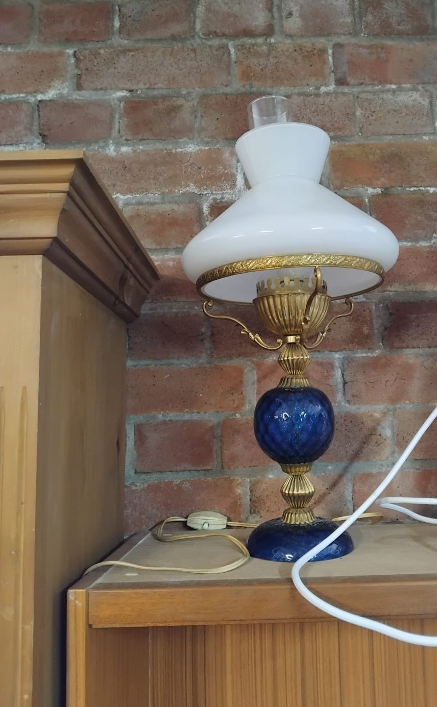 Lot 140 – A Vintage Cobalt Blue Textured Glass and Brass Hurricane Style Table Lamp