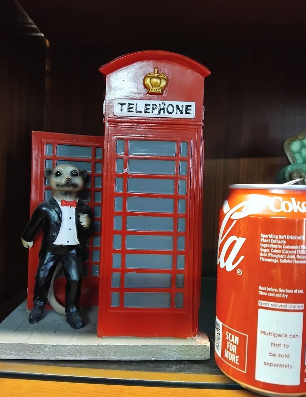 Lot 158 – Compare the Meerkat Aleksandr Orlov and Red Telephone Box Resin Figurine