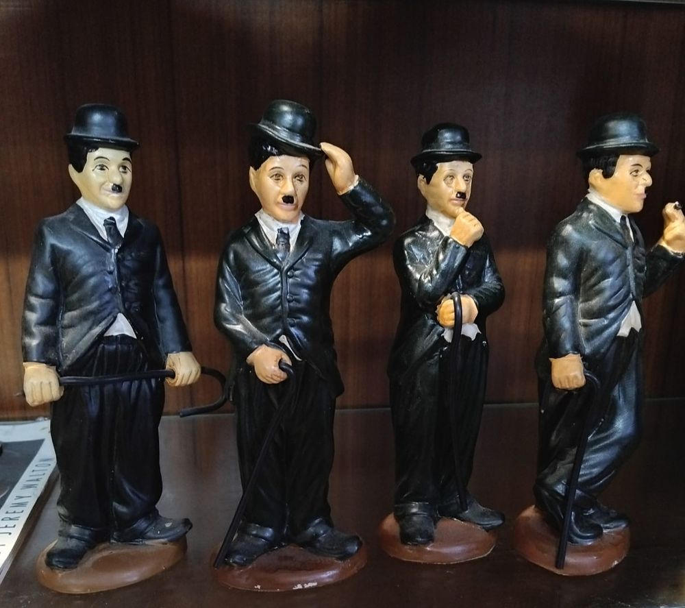 Lot 159 – A Set of Hand Painted Charlie Chaplin Figurines