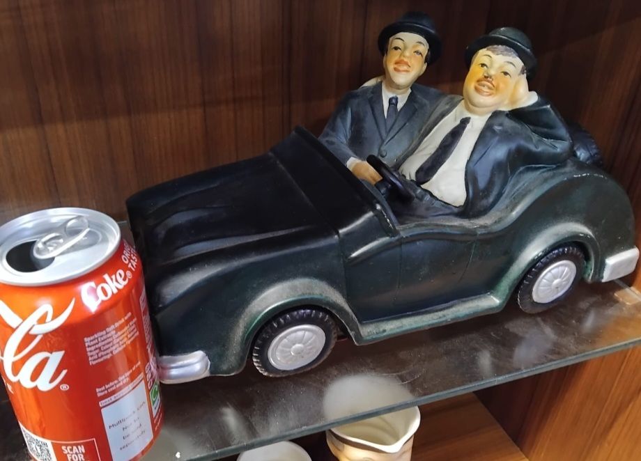 Lot 162 – A Large Hand-Painted Ceramic Laurel and Hardy Car Figurine