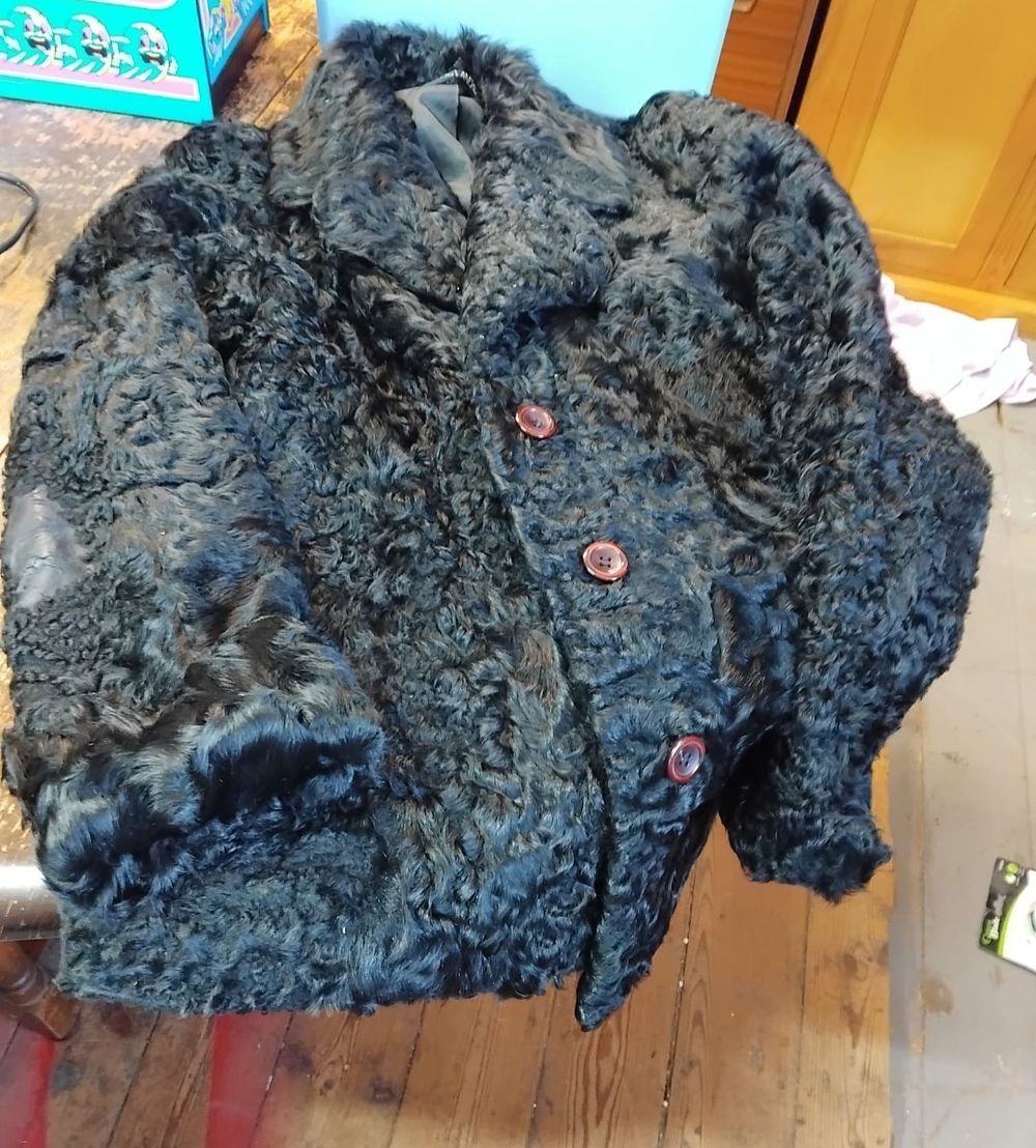 Lot 165 – A vintage  black Persian lamb style car coat