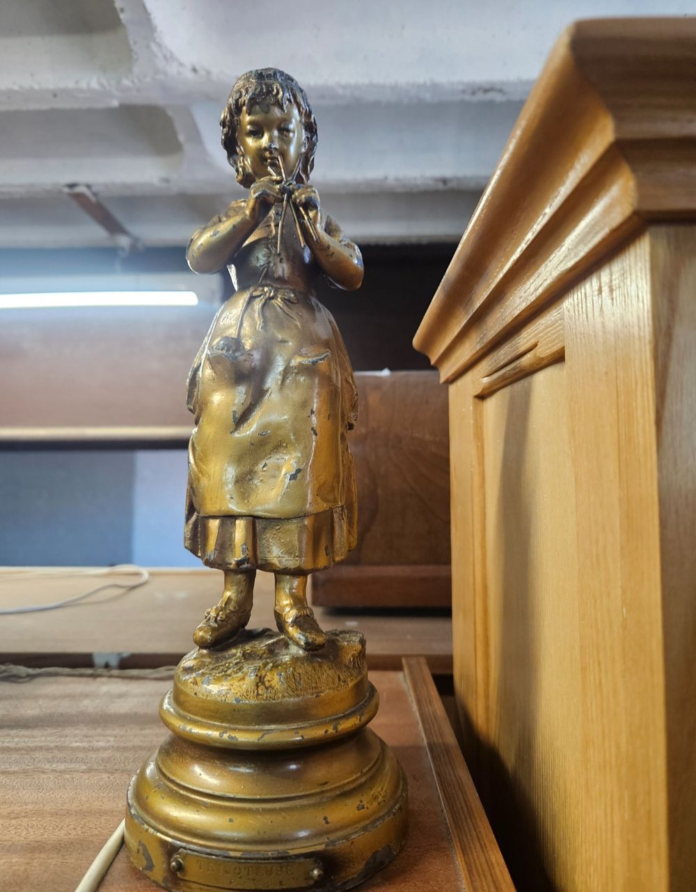 Lot 178 – Spelter Figure of a Young Girl Knitting entitled Tricoteuse