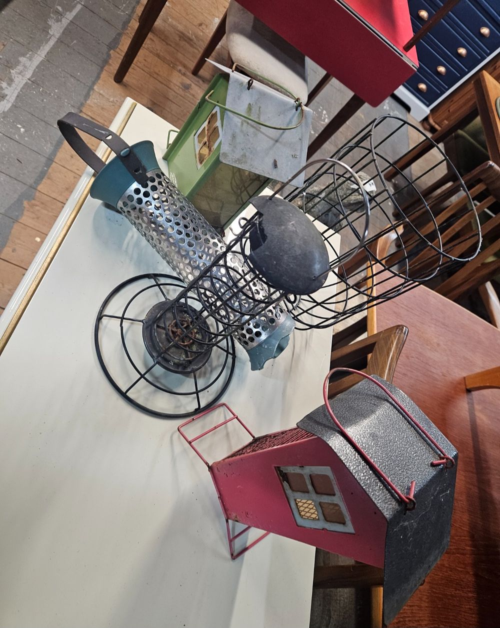 Lot 193 – A Collection of Painted and Galvanised Metal Bird Feeders