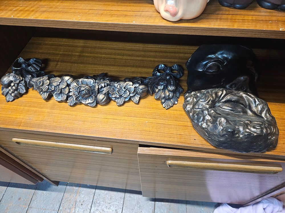 Lot 203 – A Pair of Neoclassical Style Bronzed Composition Wall Decorations