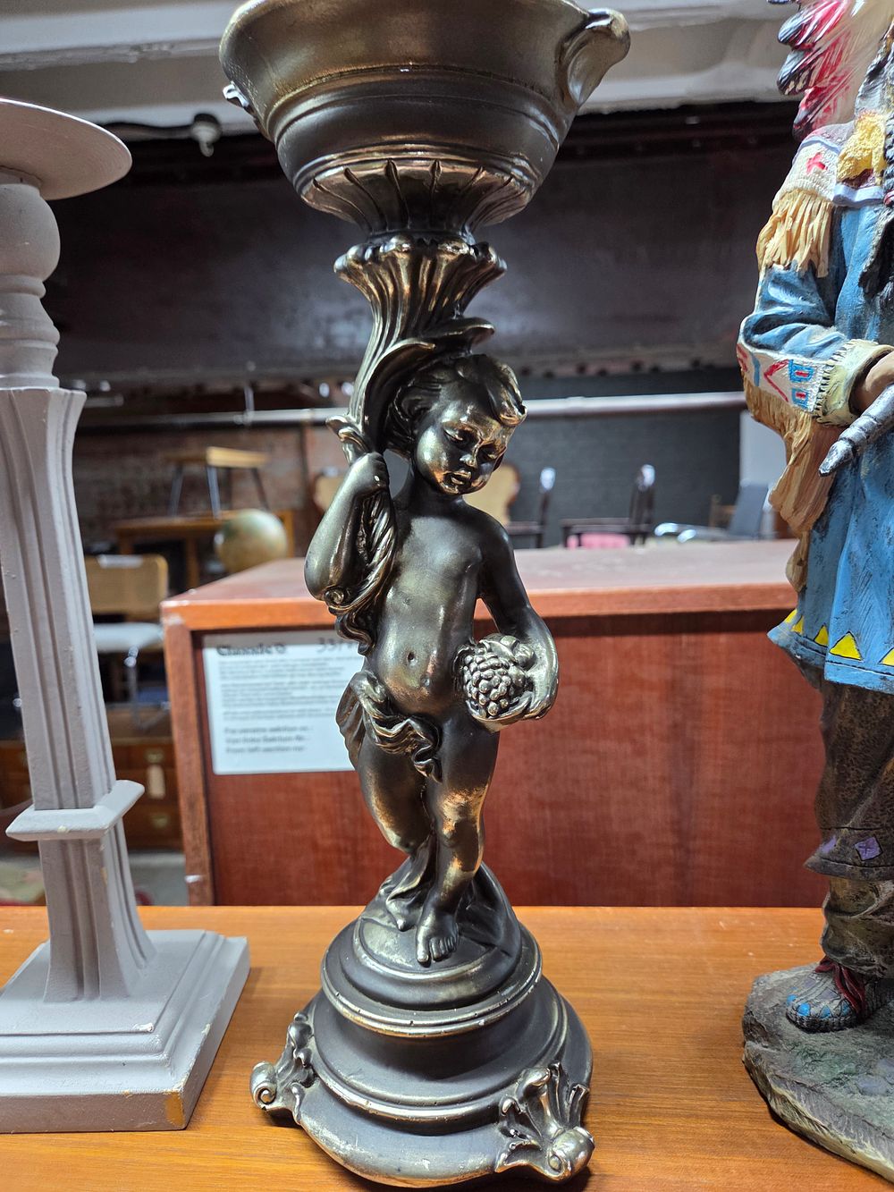 Lot 175 – A Silver Cherub Candlestick