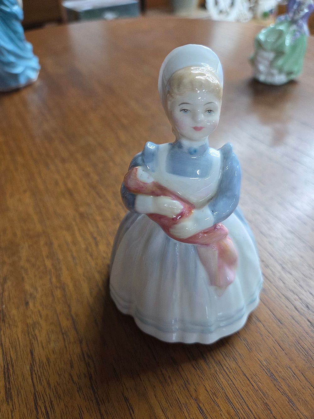 Lot 200 – A Royal Doulton The Rag Doll Ceramic Figurine