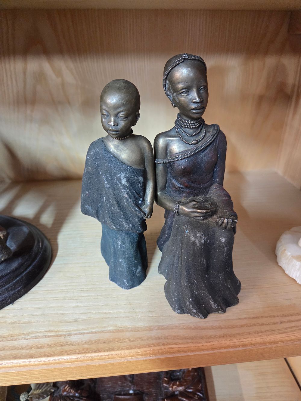 Lot 220 – Two Contemporary Cast Maasai Style Figurines