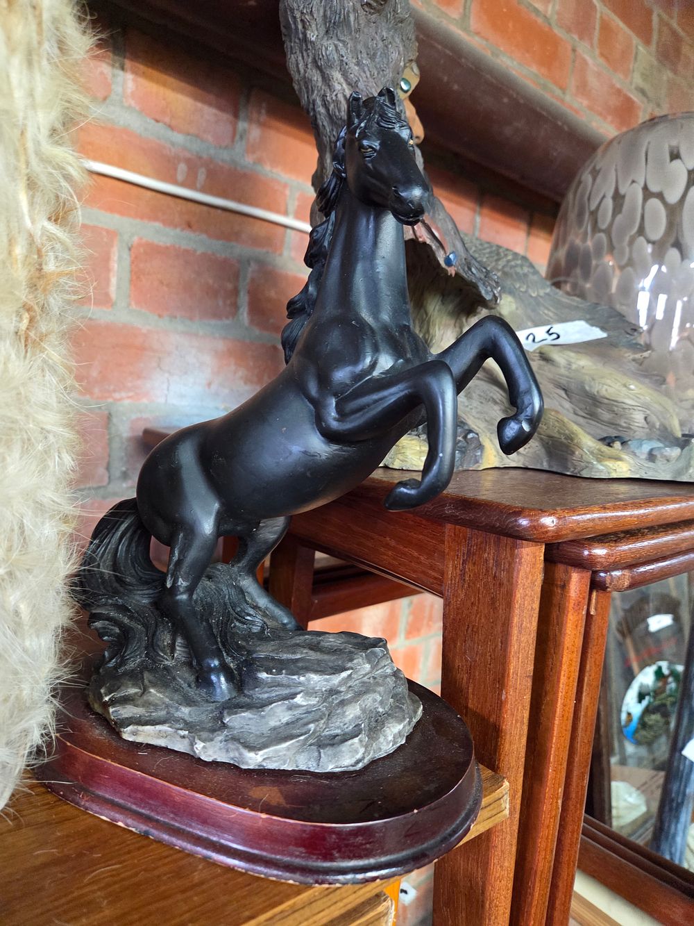 Lot 229 – A Resin Rearing Horse Figurine