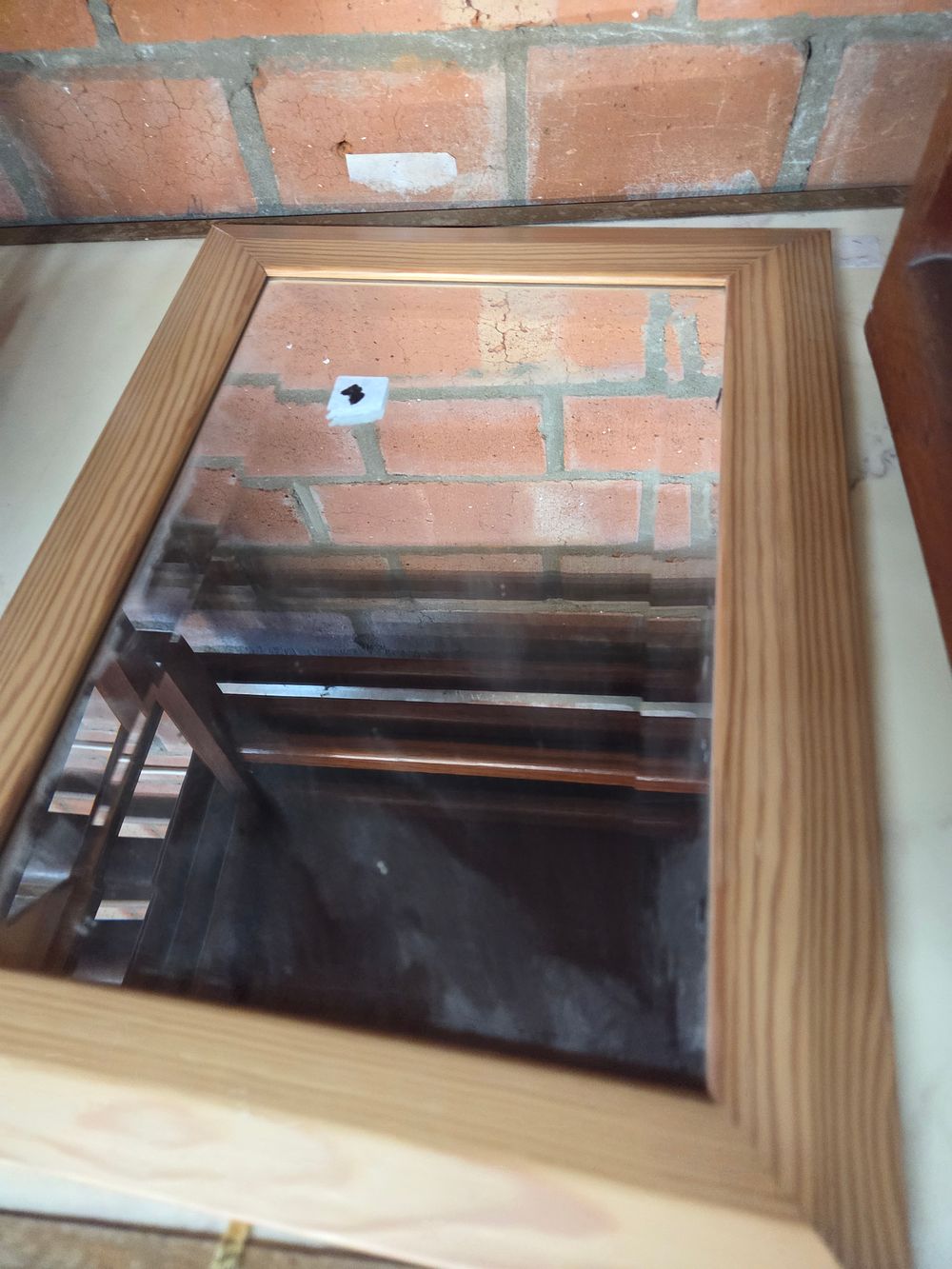 Lot 236 – A contemporary pine framed wall Mirror