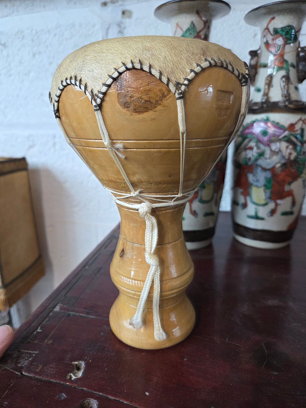 Lot 265 – A turned wood and hide Djembe Drum