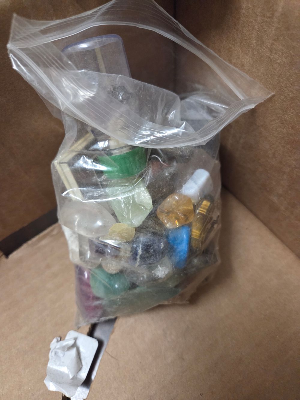 Lot 299 – An Assortment of Tumbled and Rough Minerals