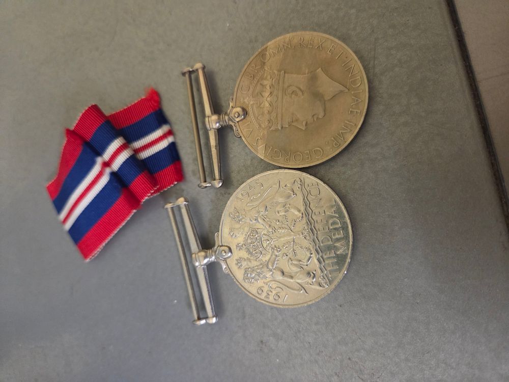 Lot 328 – Two World War II Service Medals with Ribbon Fragment