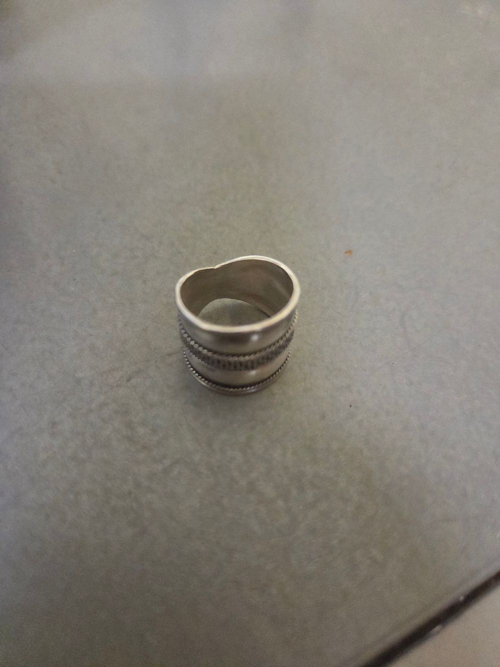 Lot 338 – A silver Open Band ring