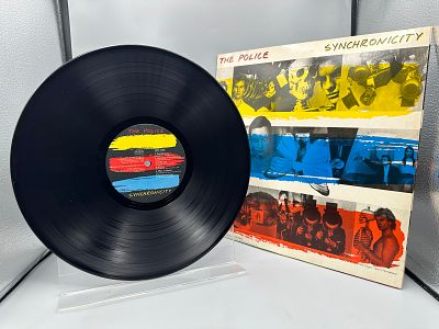 The Police: Synchronicity (1983), yellow/blue/red cover design, purple traslucent vinyl - 
