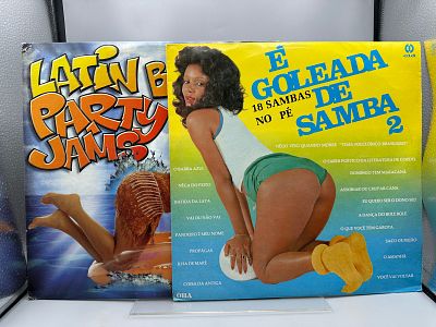 Two (2) Record Lot: Latin Booty Party Jams (1999), 2 LPs, promo hole in cover; and E Goleada De 