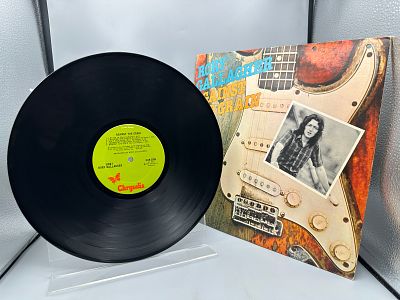 Rory Gallagher: Against The Grain (1975), promo hole in cover - Records are untested by the 