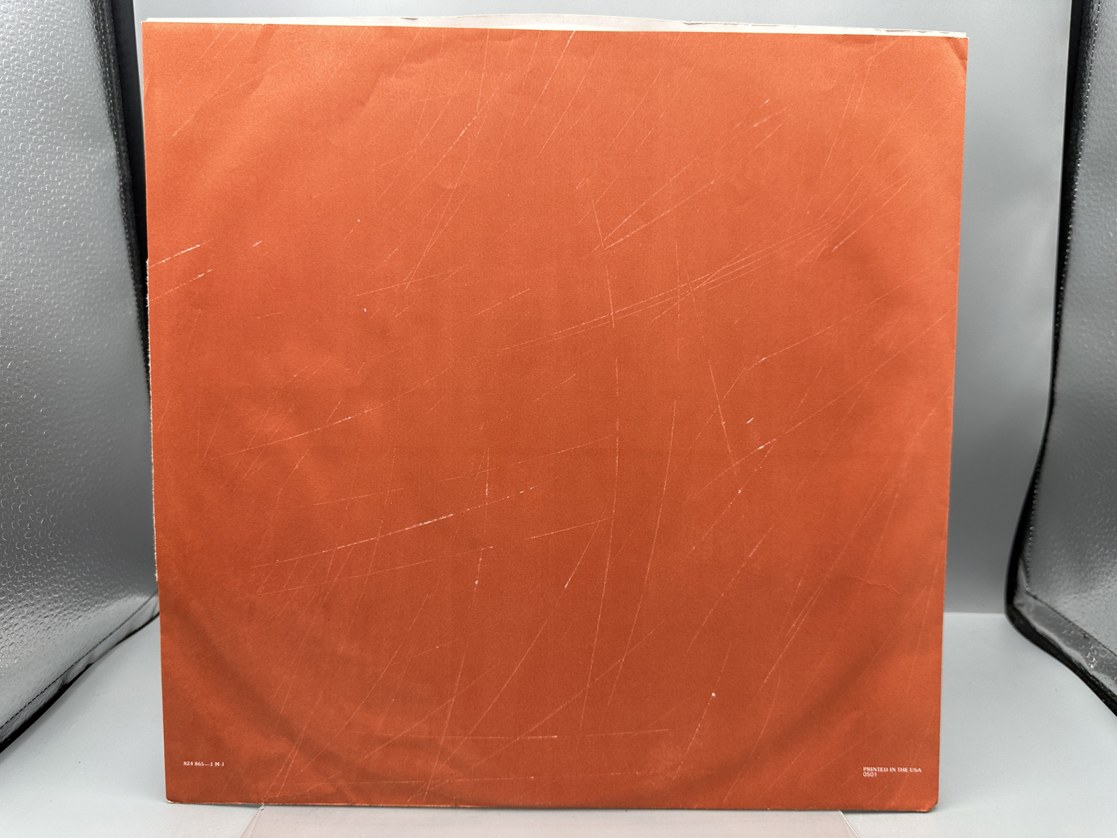 John Cougar Mellencamp: Scarecrow (1985), Club Edition; AND Three (3) 7-inch 45 rpm records with picture sleeves: Rumbleseat; Rain On the Sc